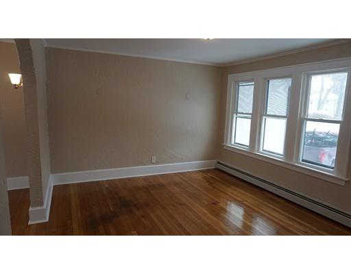 39 Neptune Avenue West Springfield, MA 01089 - Photo 7 of 28 a black and white photo of a living room