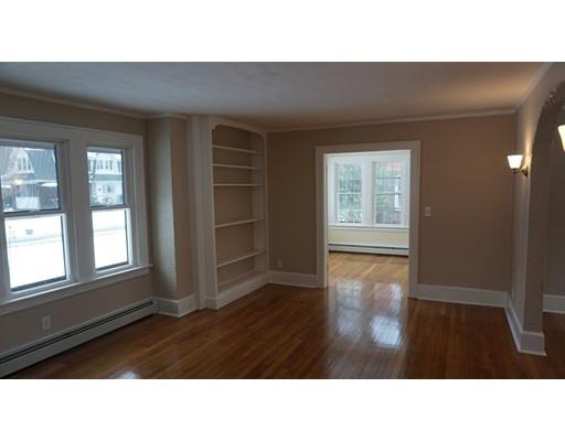 39 Neptune Avenue West Springfield, MA 01089 - Photo 8 of 28 a room with wooden floor and windows