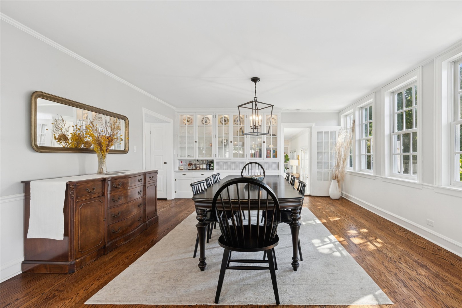 418 West Franklin Street Wheaton, IL 60187 - Photo 11 of 35 a view of a dining room with furniture window and wooden floor