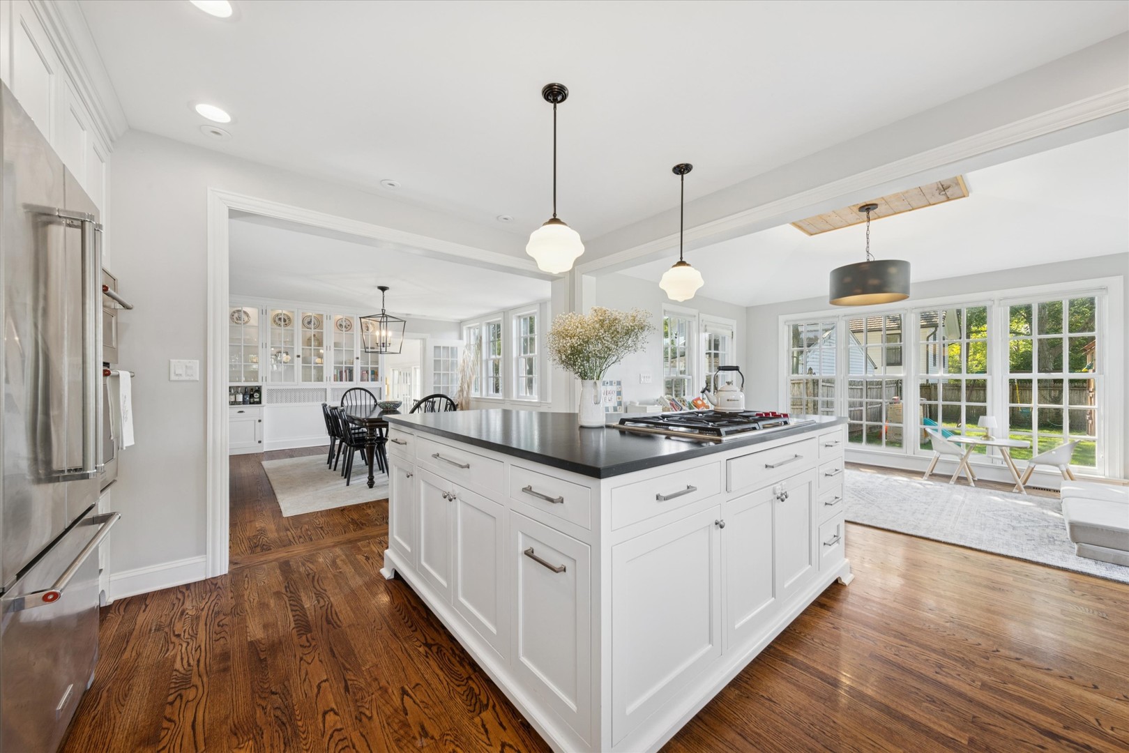 418 West Franklin Street Wheaton, IL 60187 - Photo 14 of 35 a kitchen with stainless steel appliances granite countertop a stove and a sink