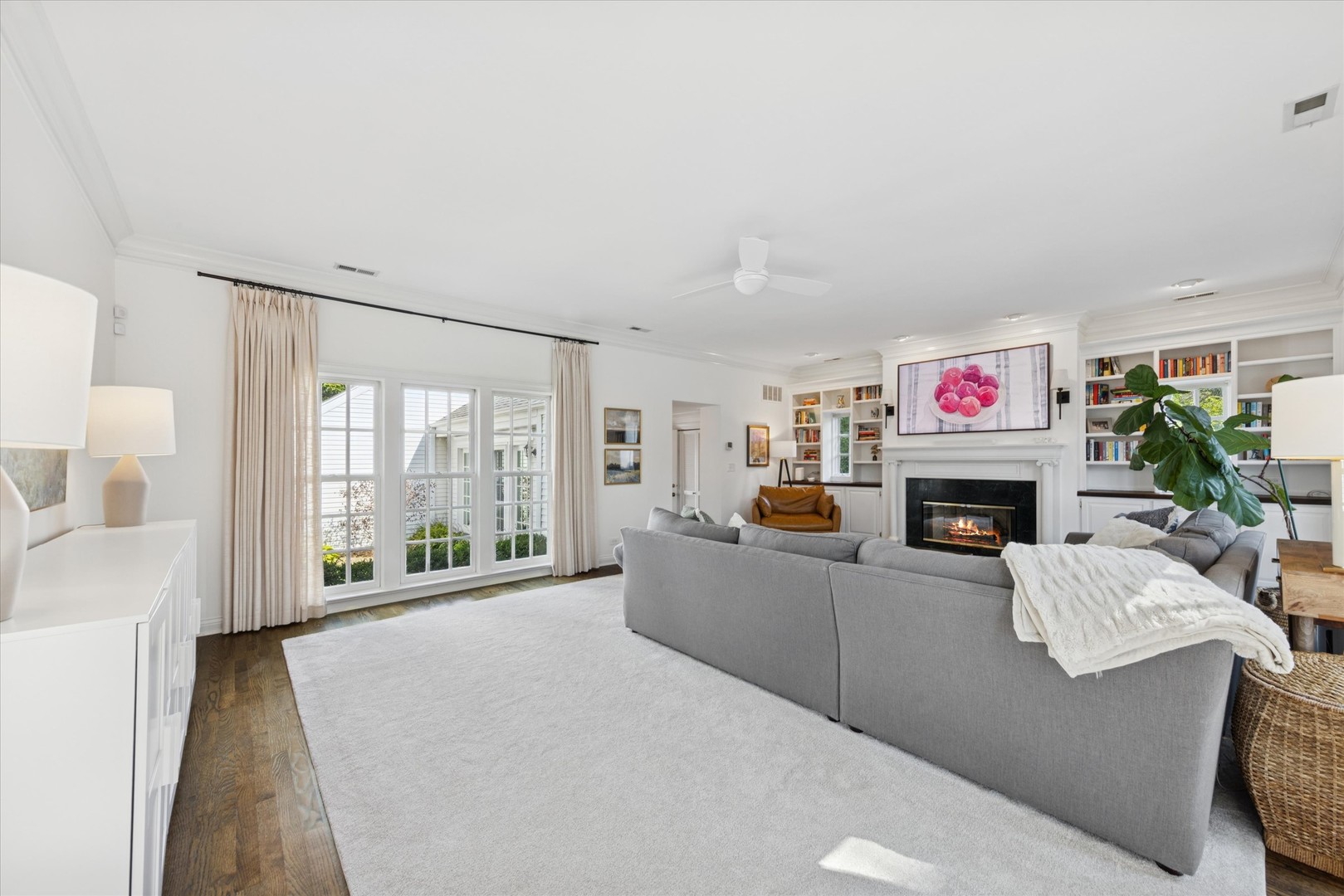 418 West Franklin Street Wheaton, IL 60187 - Photo 9 of 35 a living room with furniture large window and a fireplace