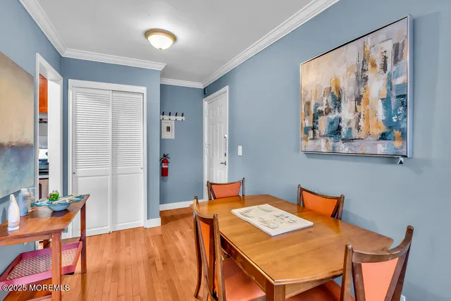 a dining room with a table and chairs