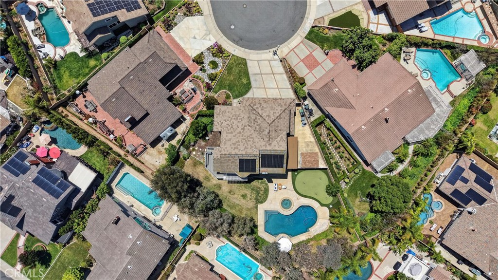 2935 Bluebell Avenue Brea, CA 92821 - Photo 31 of 38 Resort-style backyard featuring a pool, spa, putting green, spacious patio, and gazebo, perfect for entertaining and relaxing