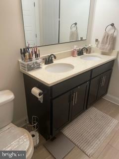 534 Green Lane Philadelphia, PA 19128 - Photo 14 of 43 a bathroom with a sink and a toilet