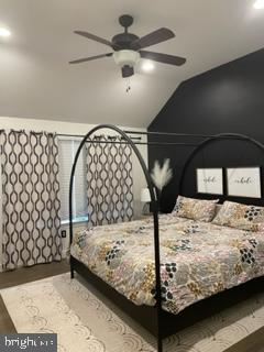 534 Green Lane Philadelphia, PA 19128 - Photo 17 of 43 a bedroom with a bed and a large mirror