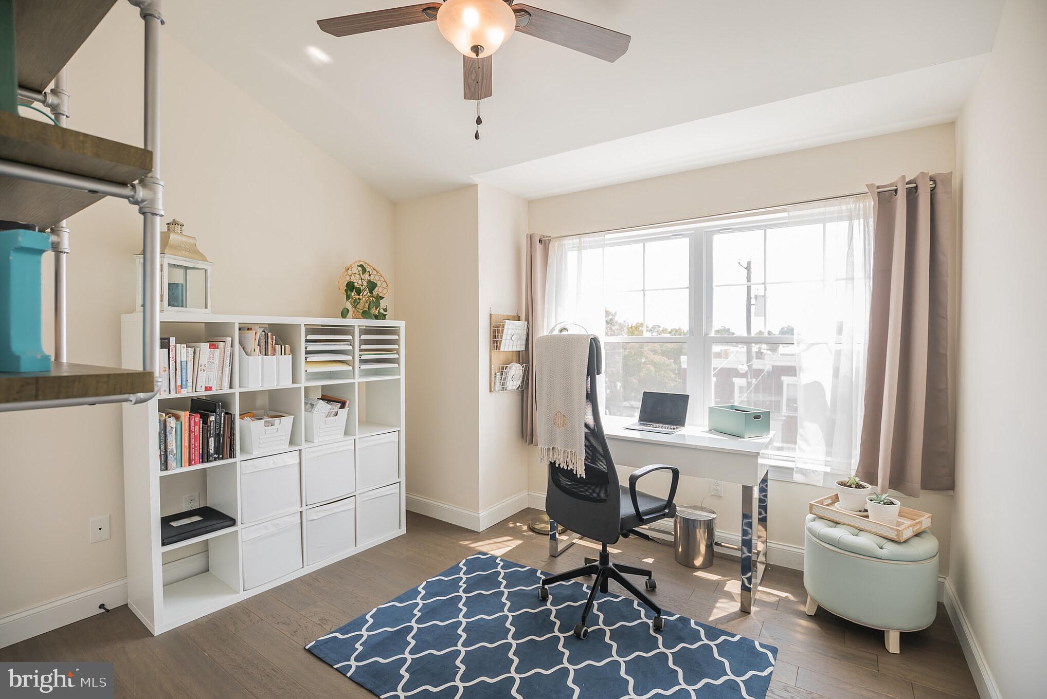 534 Green Lane Philadelphia, PA 19128 - Photo 30 of 43 a view of a livingroom with workspace and a window