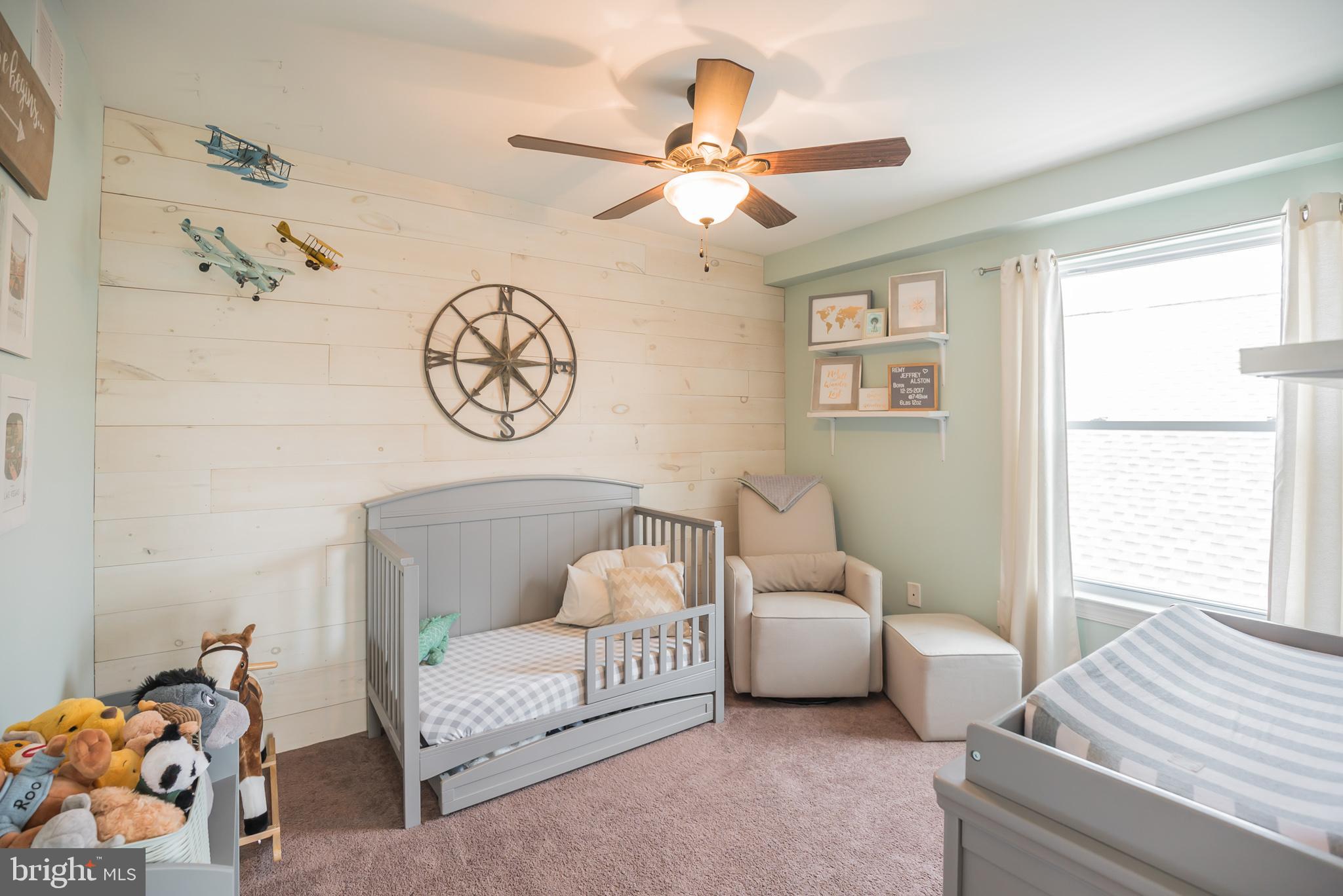 534 Green Lane Philadelphia, PA 19128 - Photo 31 of 43 a living room with furniture and a window