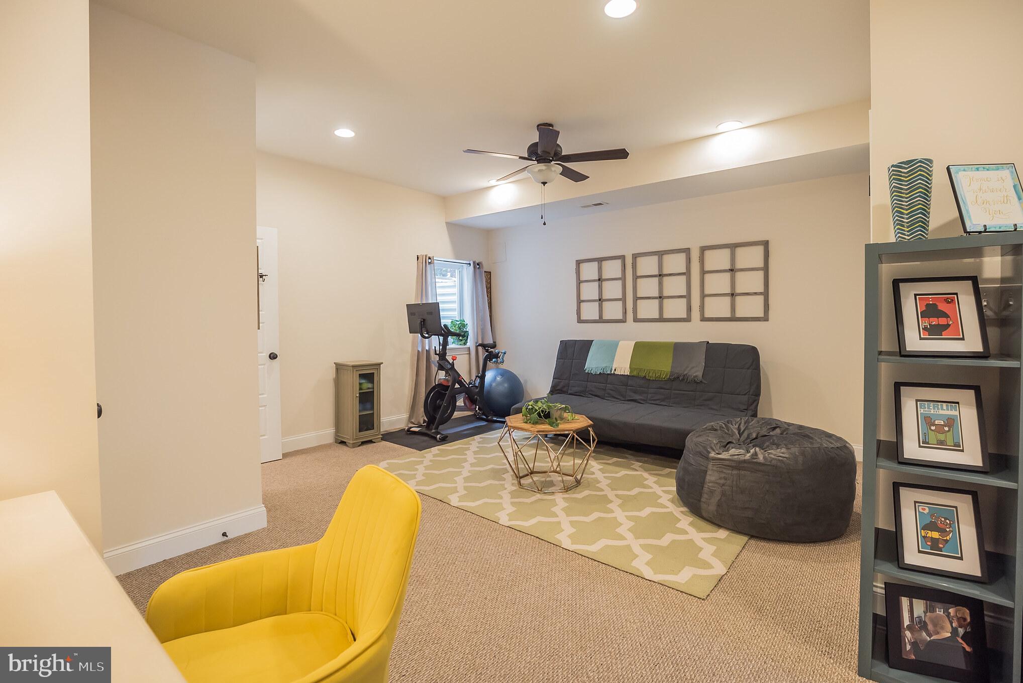 534 Green Lane Philadelphia, PA 19128 - Photo 39 of 43 a living room with furniture and a lamp