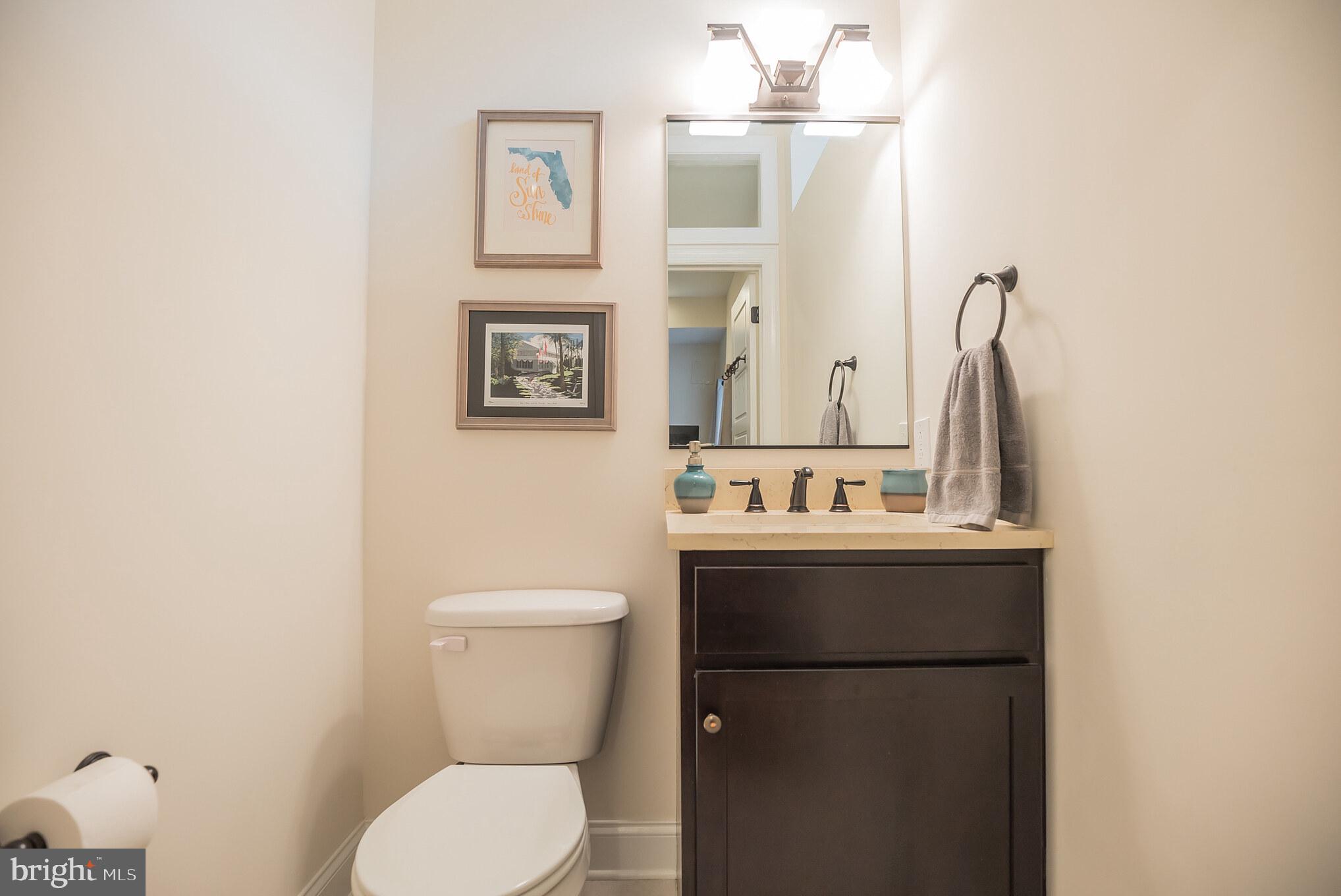 534 Green Lane Philadelphia, PA 19128 - Photo 41 of 43 a bathroom with a toilet sink and mirror