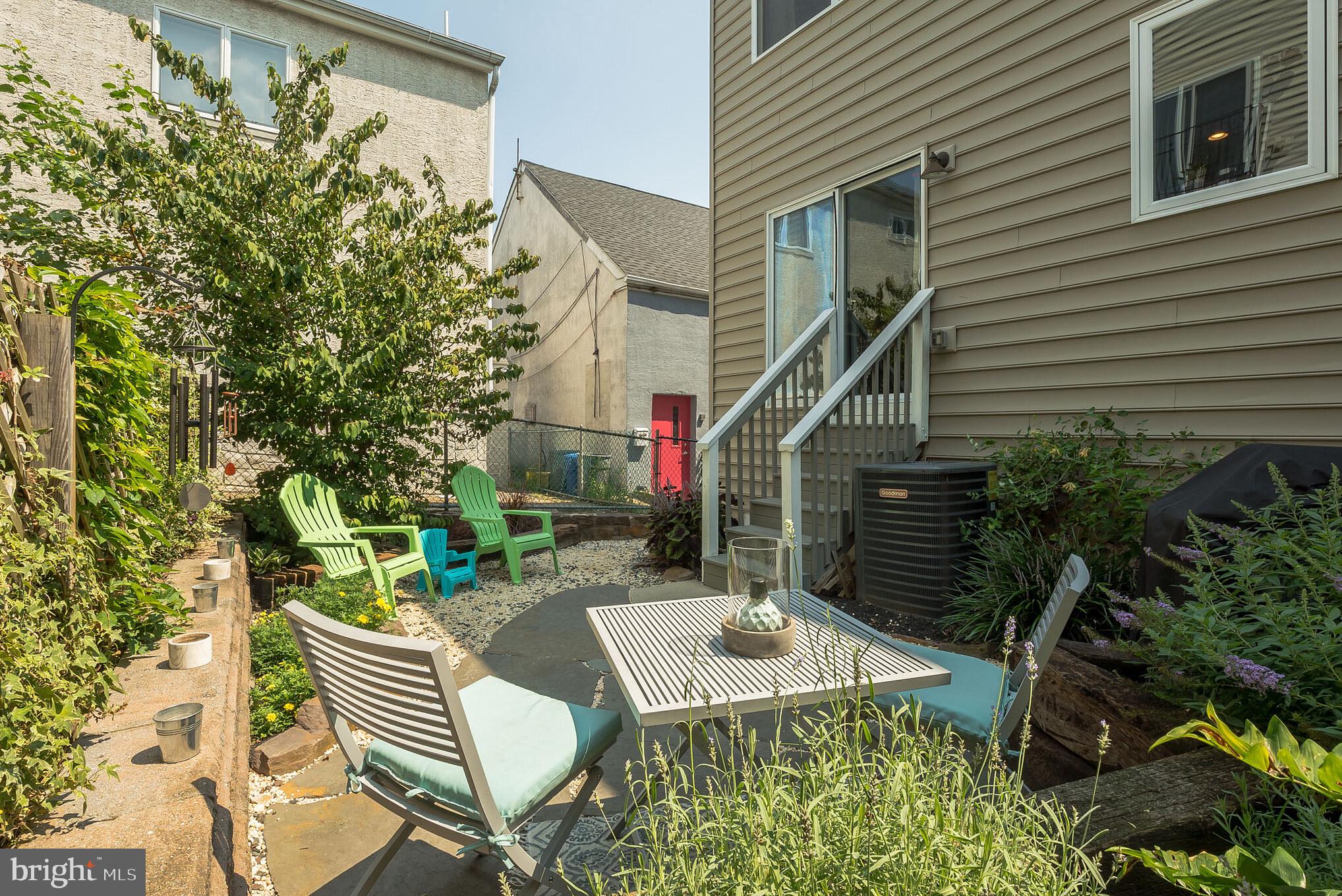 534 Green Lane Philadelphia, PA 19128 - Photo 43 of 43 a wooden bench sitting in front of a house
