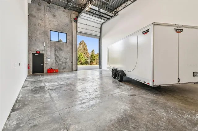 a view of a refrigerator and cabinets