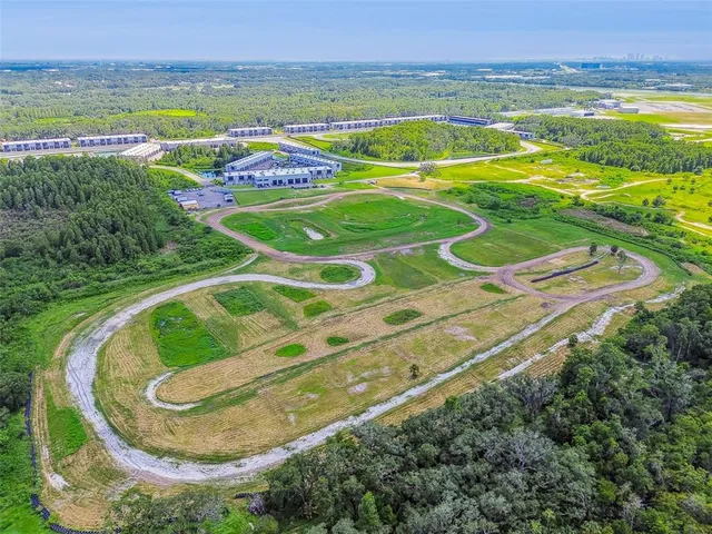 a view of a city with a large pool