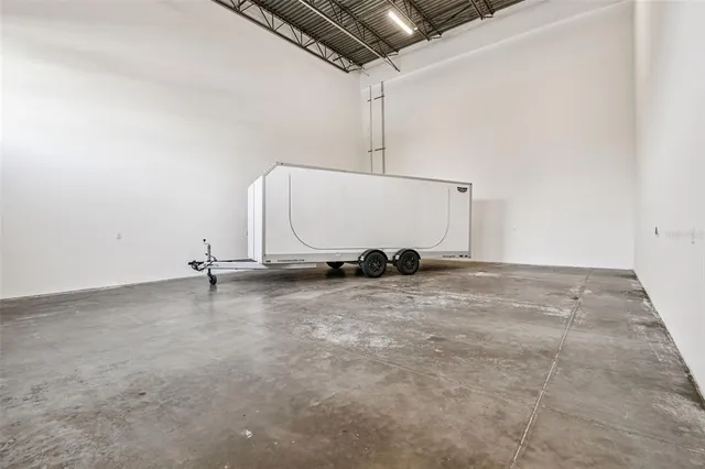 an empty room with wooden floor