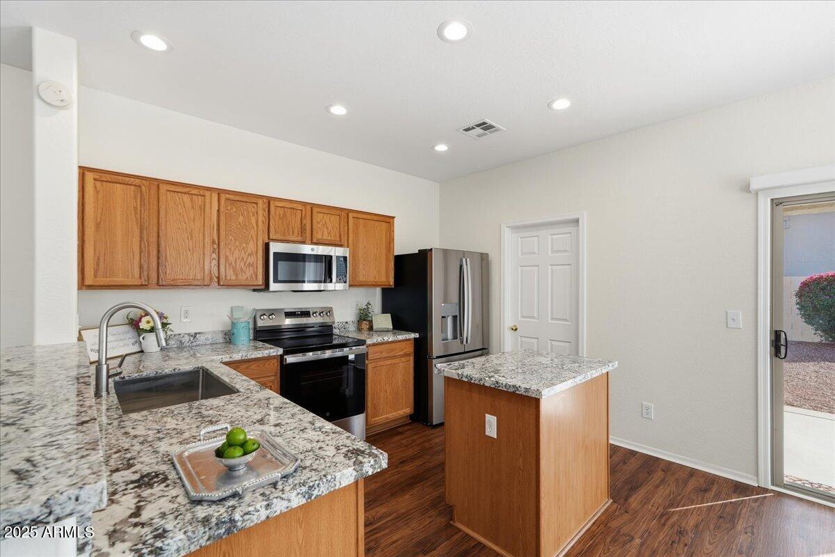 16811 West Rimrock Street Surprise, AZ 85388 - Photo 3 of 20 Sizable kitchen with island