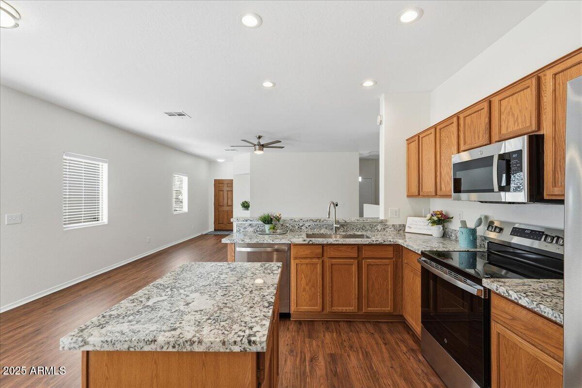 16811 West Rimrock Street Surprise, AZ 85388 - Photo 5 of 20 Open concept kitchen