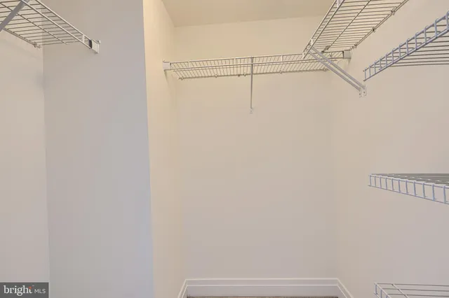 a view of a room with racks on the wall