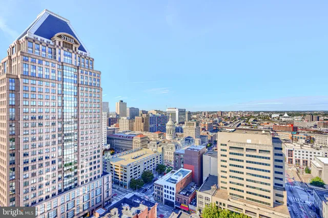 a view of a city with tall buildings