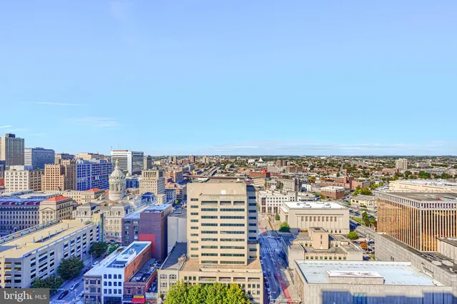 a view of city with ocean