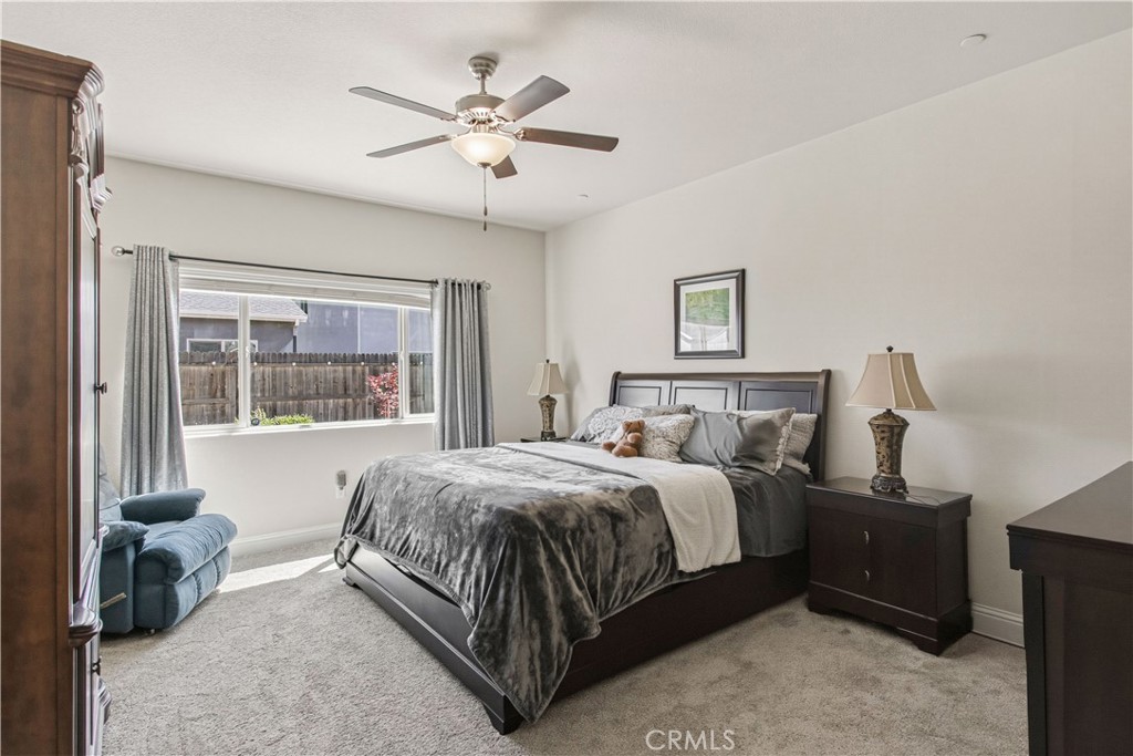 3716 Magellan Drive Merced, CA 95340 - Photo 16 of 27 a bed room with a bed and window