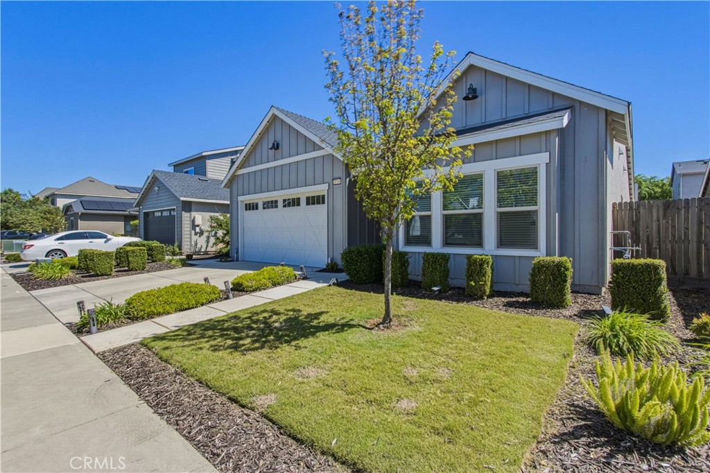 3716 Magellan Drive Merced, CA 95340 - Photo 2 of 27 a front view of a house with garden