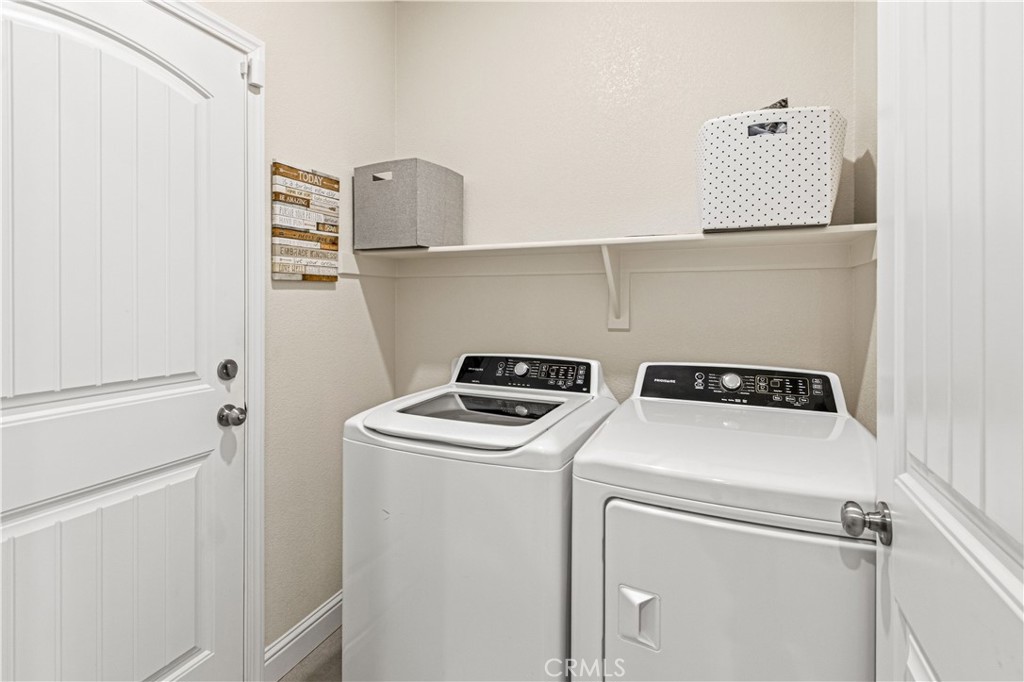 3716 Magellan Drive Merced, CA 95340 - Photo 21 of 27 a utility room with dryer and washer
