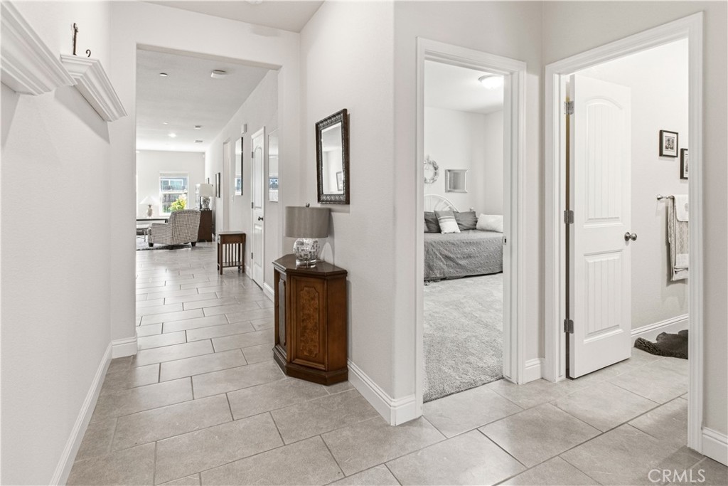 3716 Magellan Drive Merced, CA 95340 - Photo 10 of 27 a view of a hallway with furniture and a livingroom view