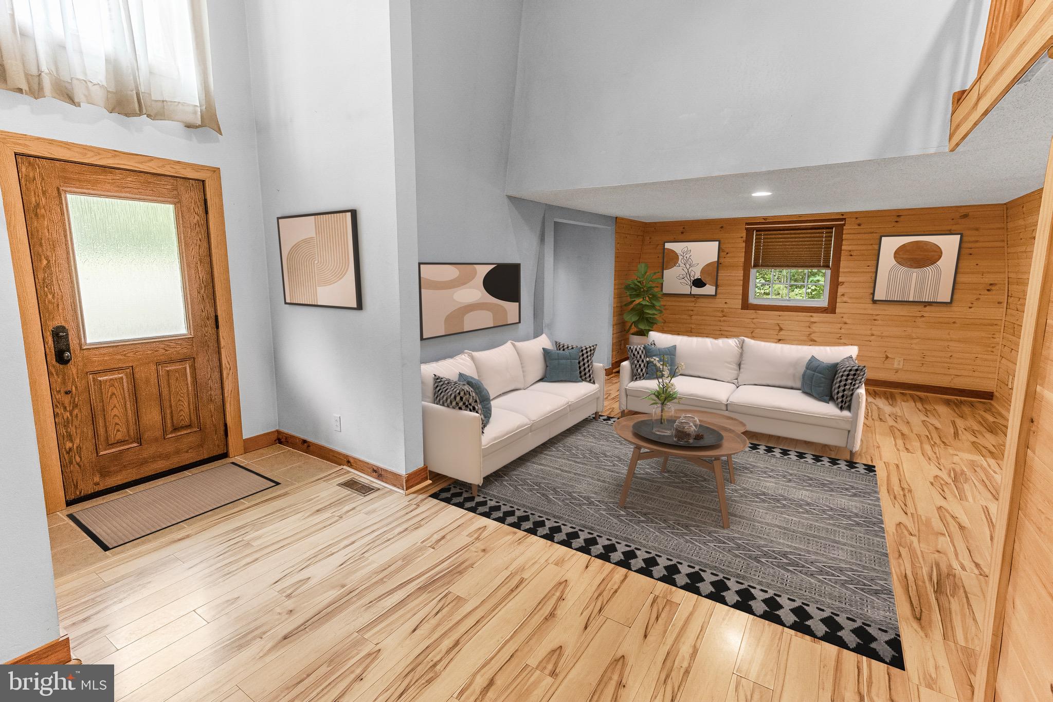 2160 Black Bear Road Needmore, PA 17238 - Photo 27 of 78 living room/front door entry virtually staged