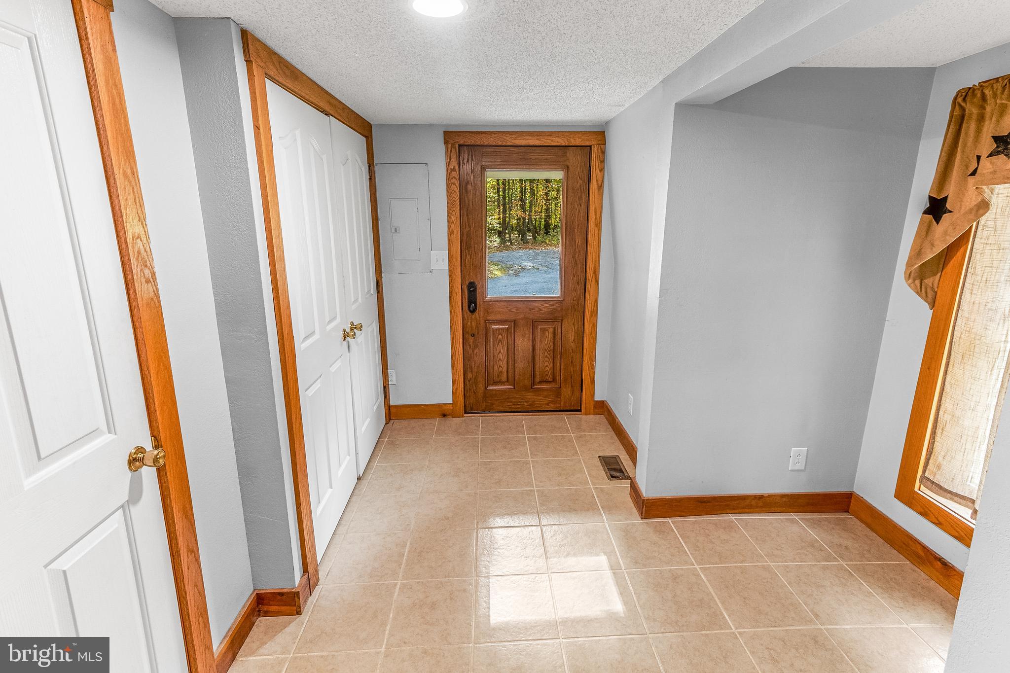 2160 Black Bear Road Needmore, PA 17238 - Photo 55 of 78 side porch entry/mudroom