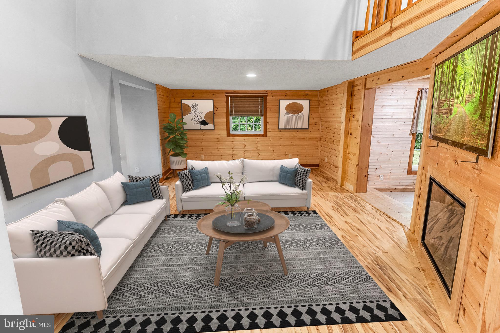 2160 Black Bear Road Needmore, PA 17238 - Photo 9 of 78 living room w/ electric fireplace virtually staged