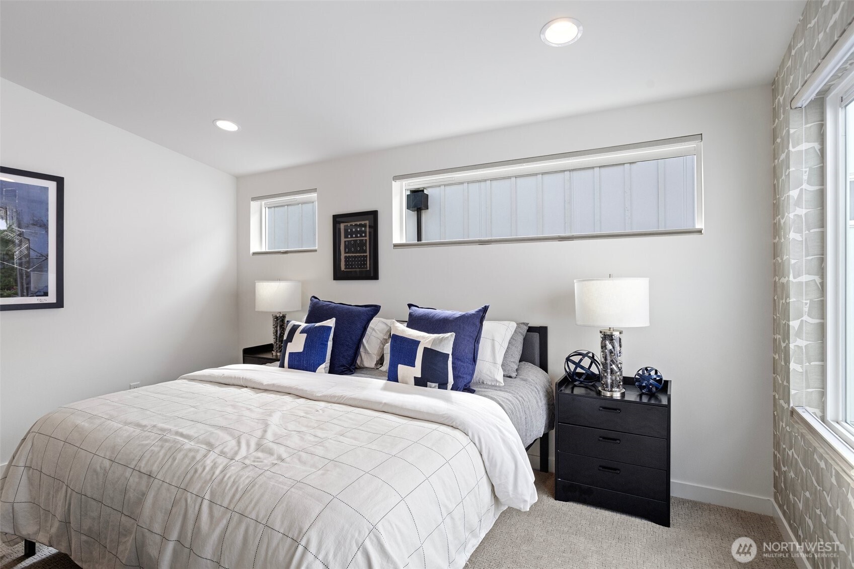 2527 29th Avenue South, Unit C Seattle, WA 98144 - Photo 17 of 20 a bedroom with a bed and a window