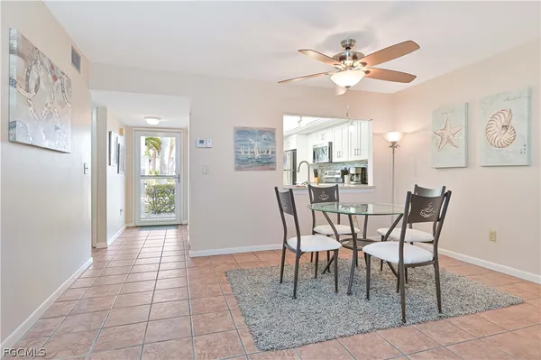 a view of a dining room with furniture