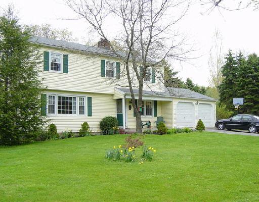47 Ridgedale Road Bethel, CT 06801 - Photo 1 of 1 a front view of a house with a yard and trees