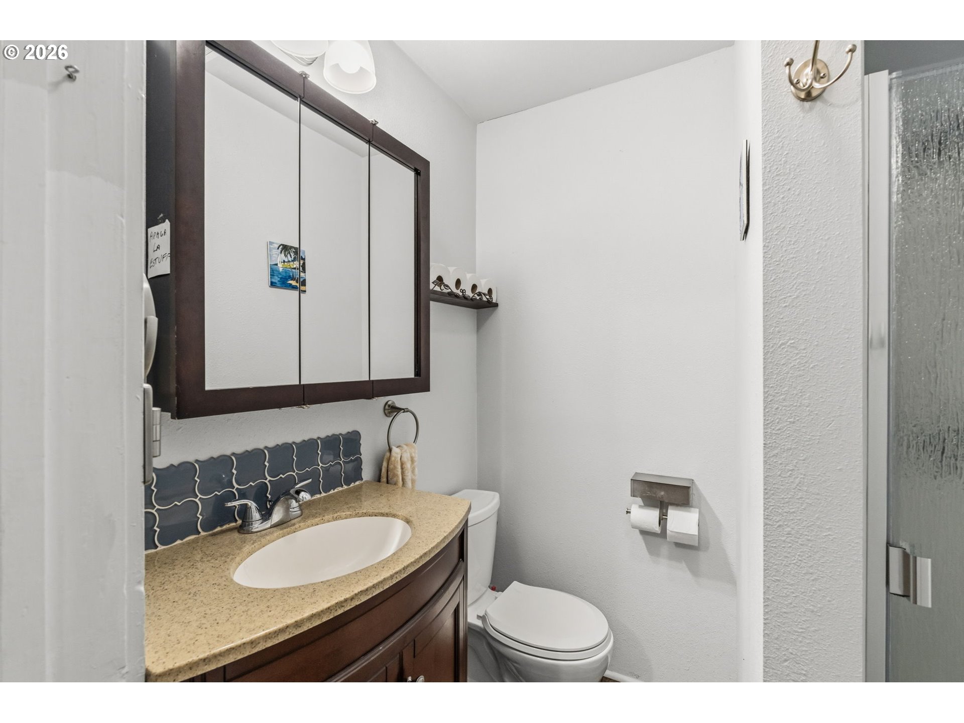 3315 West 18th Avenue Eugene, OR 97402 - Photo 12 of 26 a bathroom with a sink and a mirror