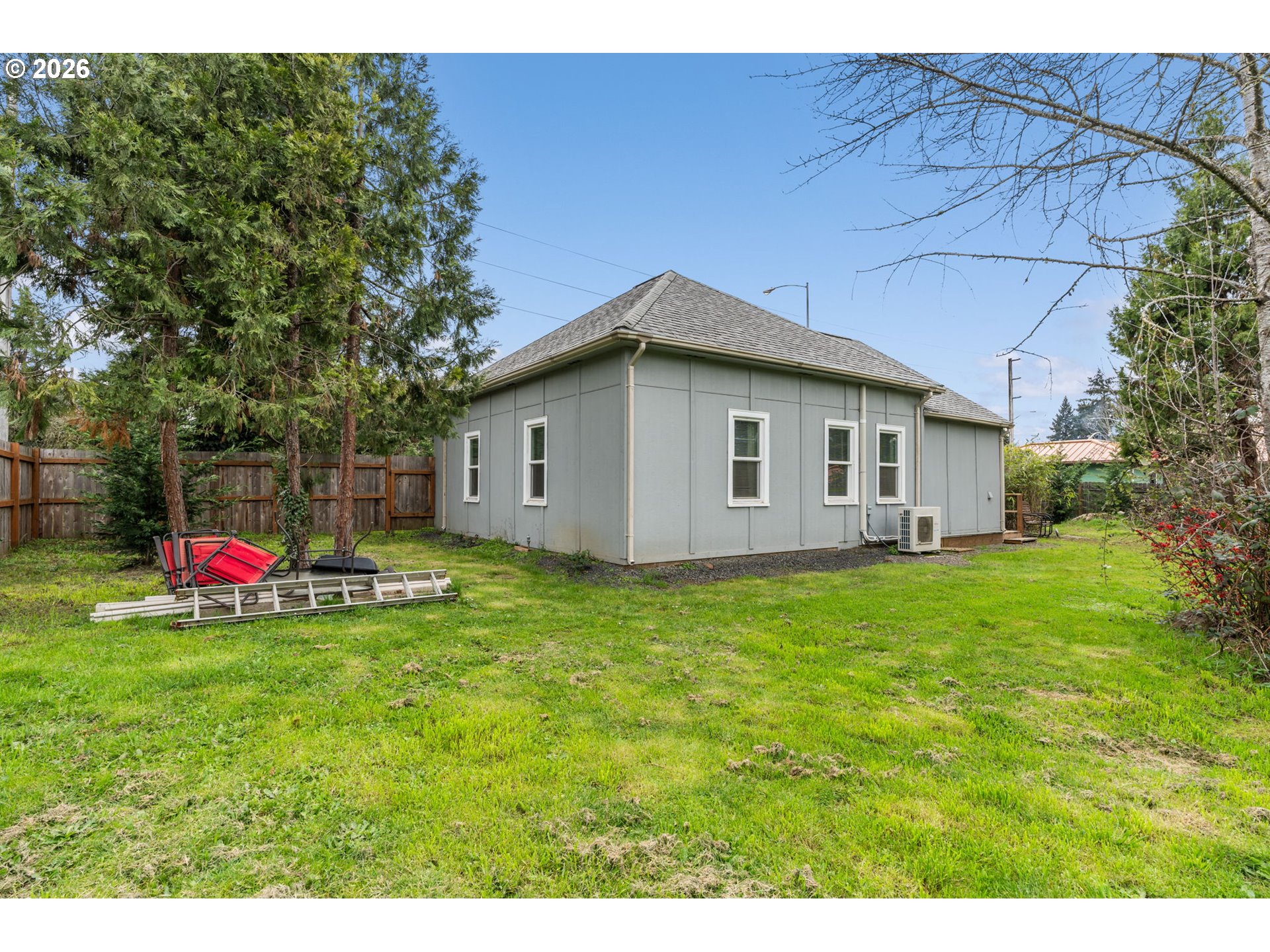 3315 West 18th Avenue Eugene, OR 97402 - Photo 19 of 26 a view of a house with a backyard