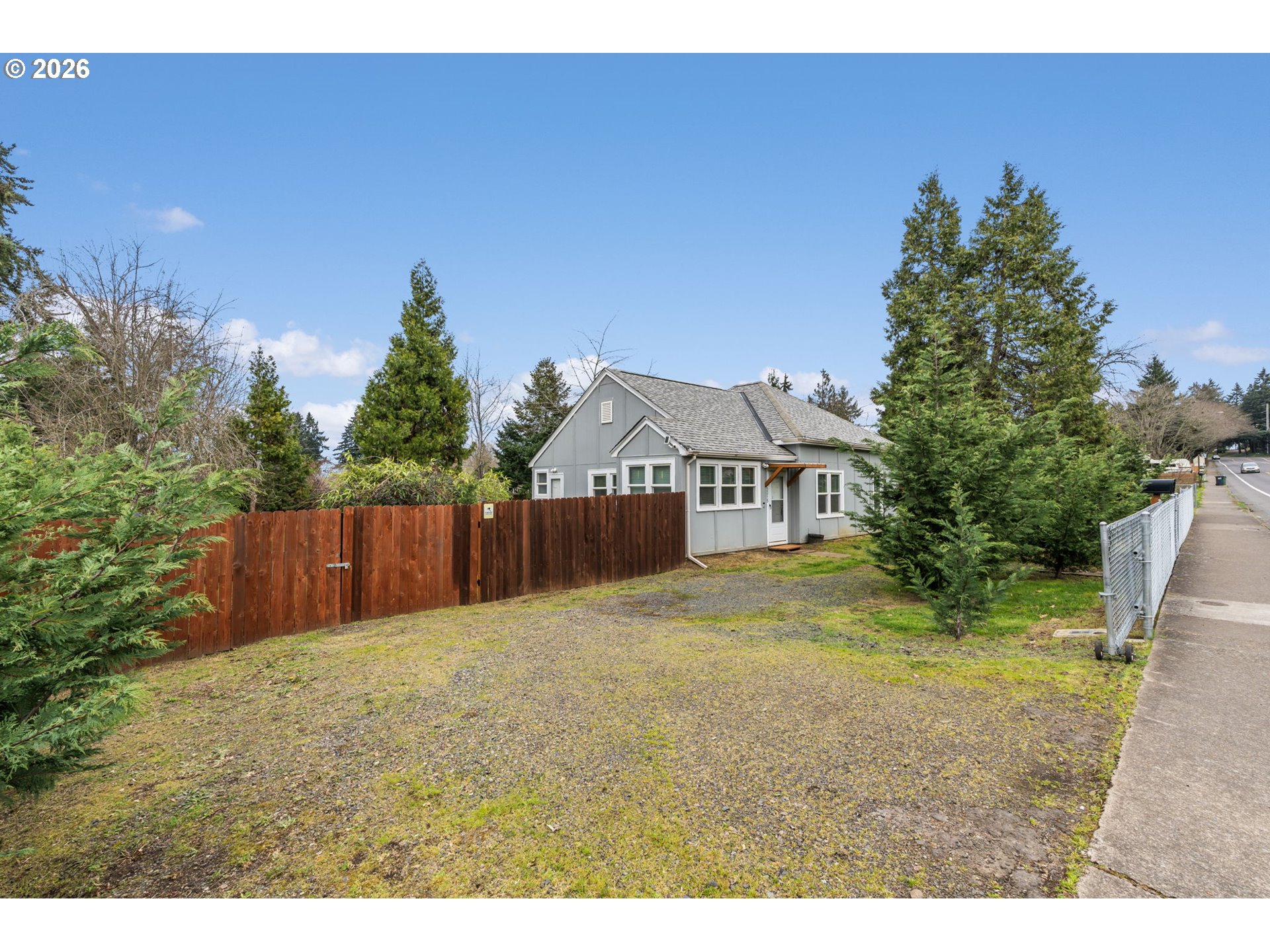 3315 West 18th Avenue Eugene, OR 97402 - Photo 22 of 26 a view of a house with a yard