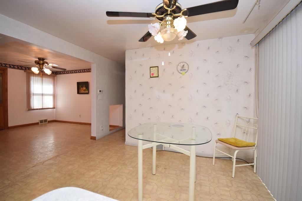 167 Woodcrest Road Springfield, MA 01129 - Photo 11 of 22 a view of a livingroom with furniture and chandelier fan