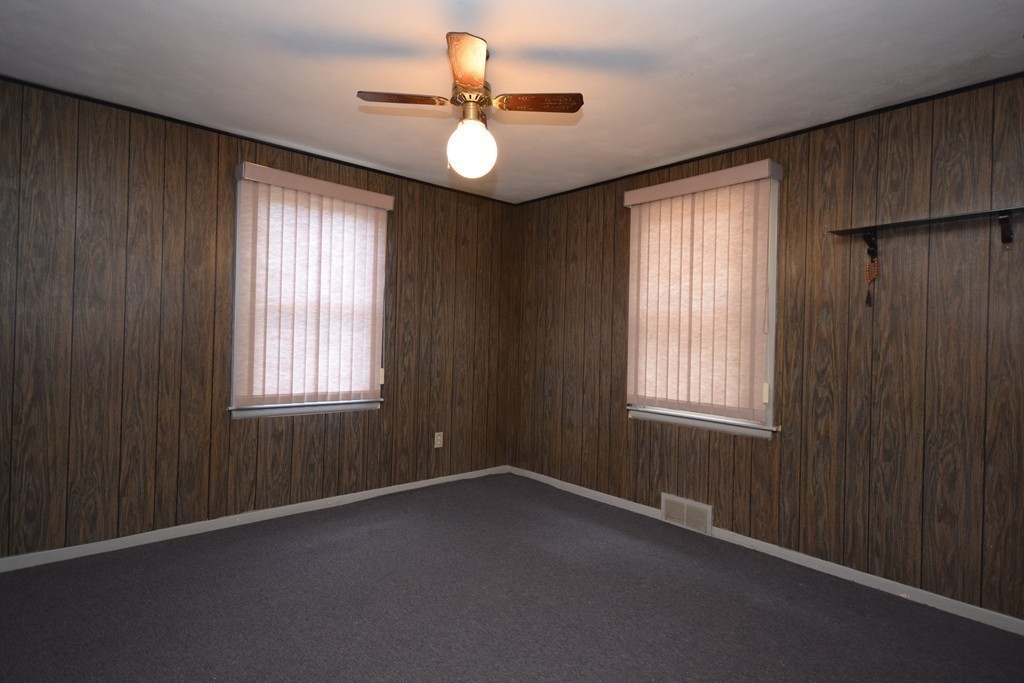167 Woodcrest Road Springfield, MA 01129 - Photo 8 of 22 an empty room with windows and fan
