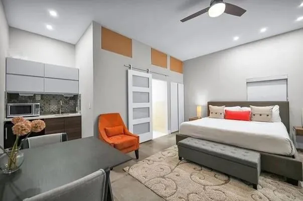 a workspace with furniture and wooden floor