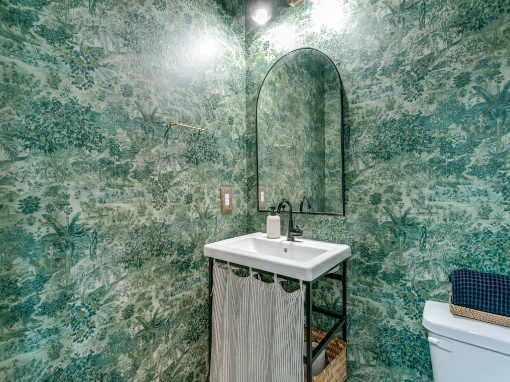 12964 Rockham Lane Dallas, TX 75234 - Photo 12 of 24 Half bath on first floor with decorative wallpaper added.