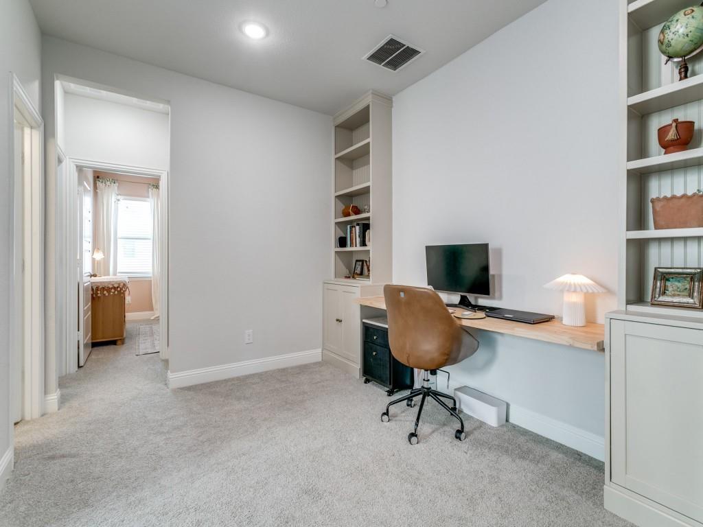 12964 Rockham Lane Dallas, TX 75234 - Photo 16 of 24 Loft area upstairs with built-ins and desk.