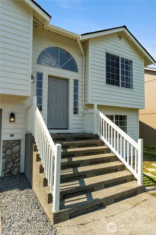 a front view of a house with a balcony