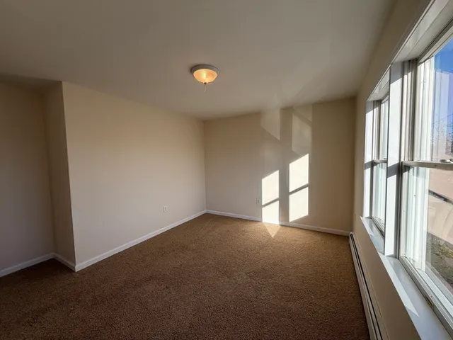 an empty room with windows