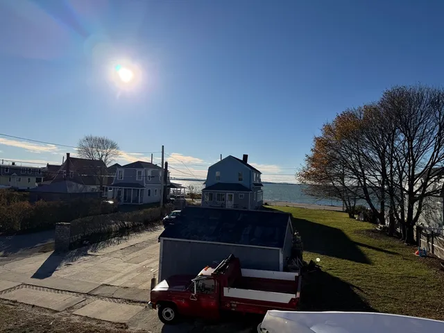 a view of a balcony with chairs
