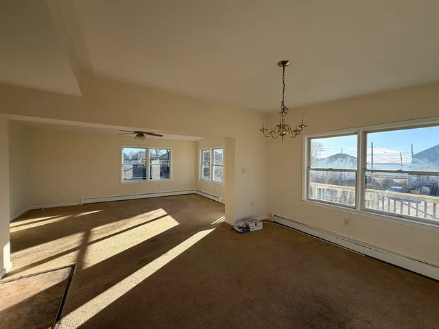 a view of a room with windows