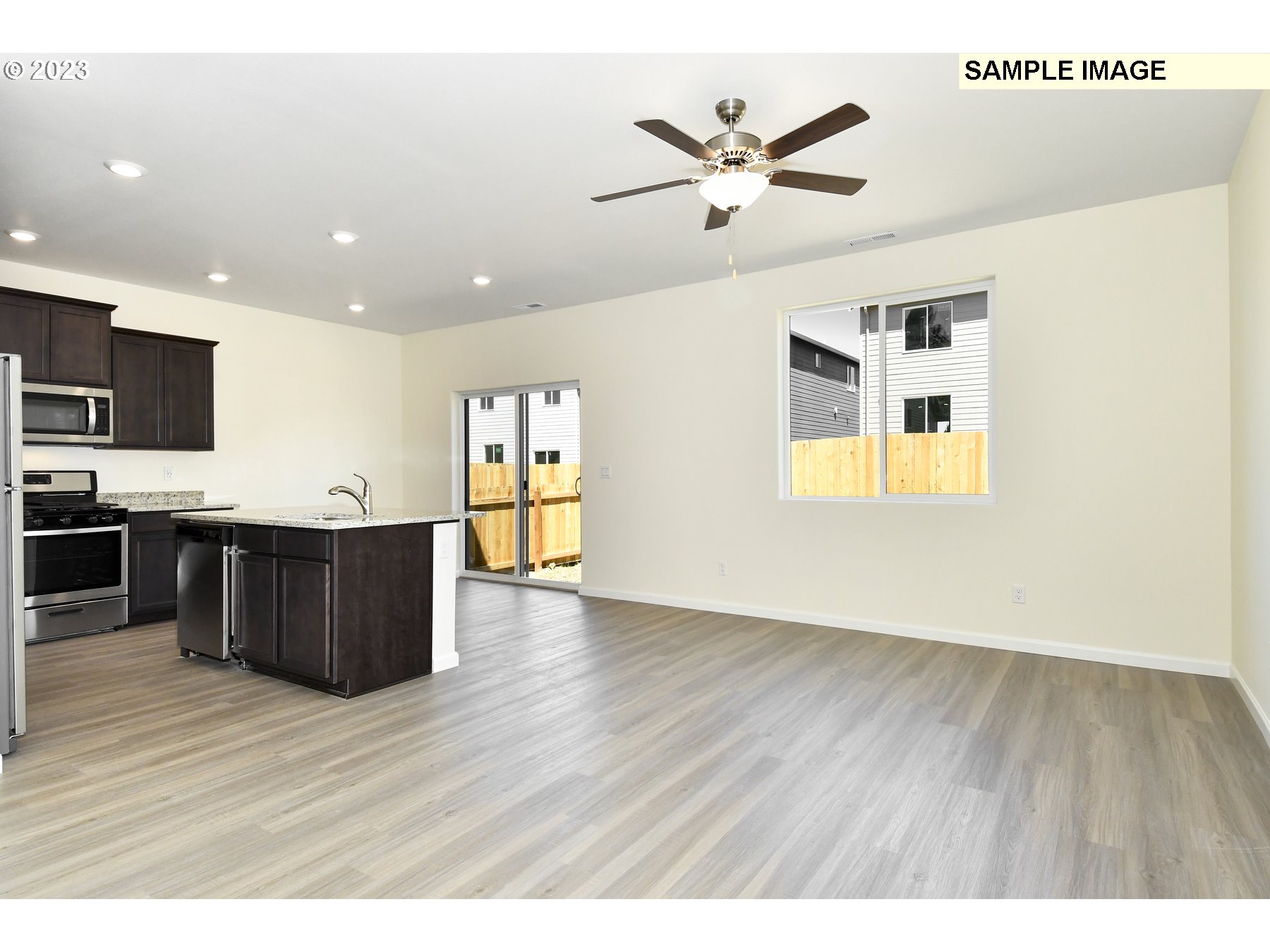 3956 Southwest Knapp Drive Gresham, OR 97080 - Photo 3 of 14 a view of kitchen with wooden floor