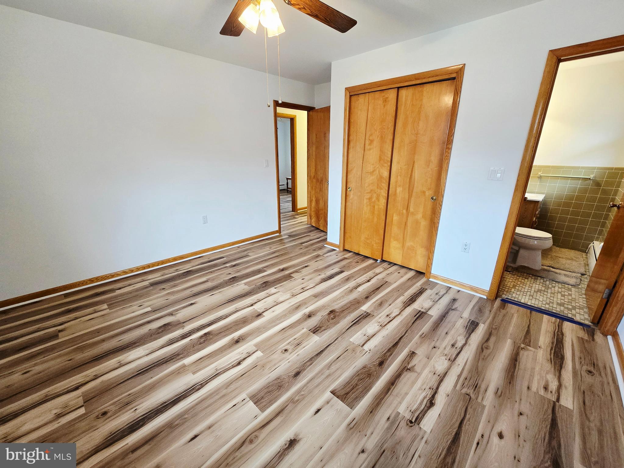 15421 Shamrock Road Southwest Cumberland, MD 21502 - Photo 23 of 39 a view of a room with wooden floor and windows