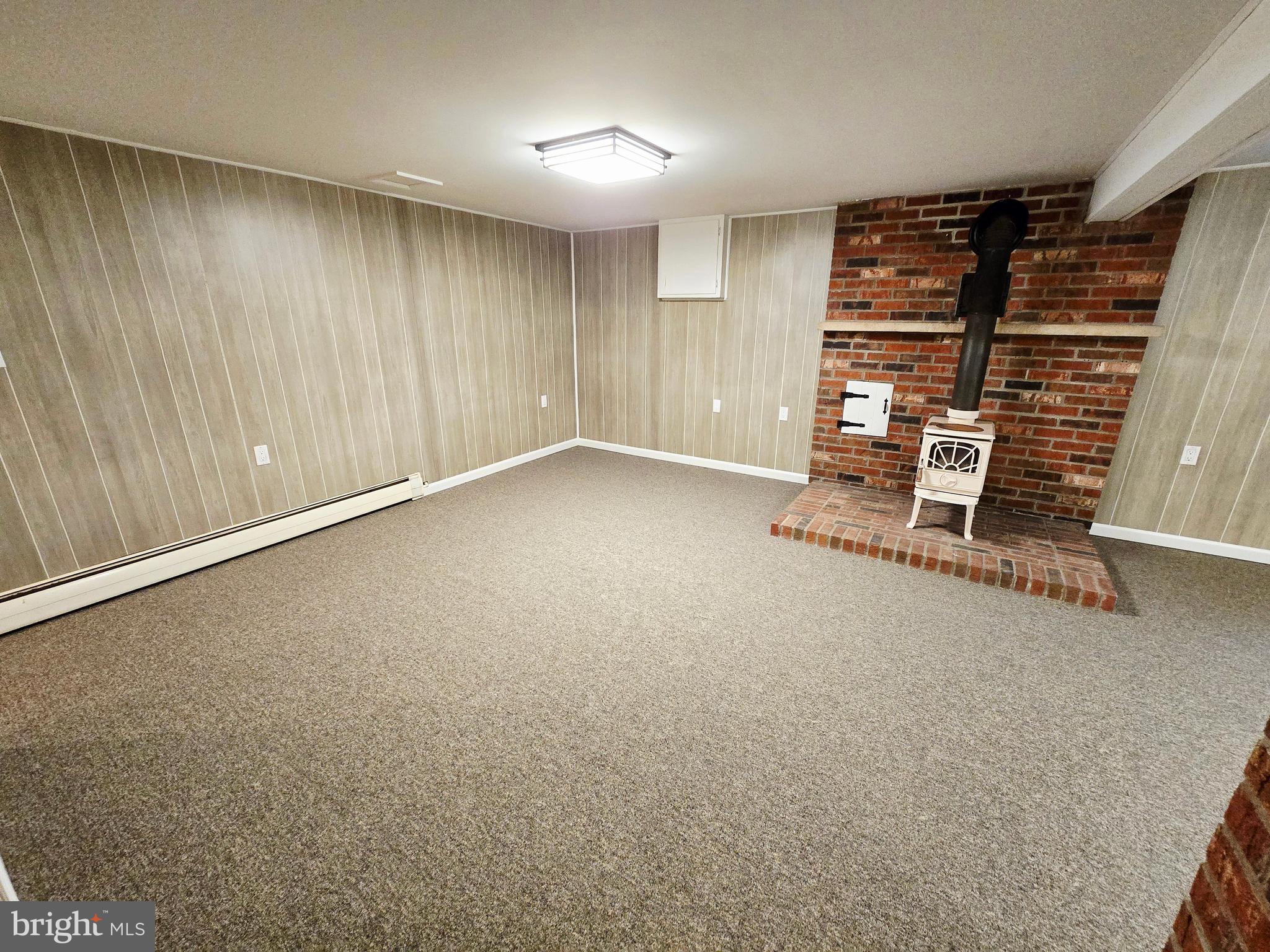 15421 Shamrock Road Southwest Cumberland, MD 21502 - Photo 28 of 39 a view of an empty room with a fireplace