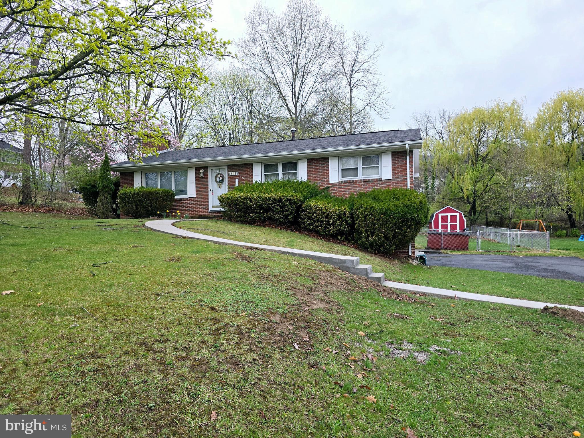 15421 Shamrock Road Southwest Cumberland, MD 21502 - Photo 36 of 39 a front view of a house with a yard and trees