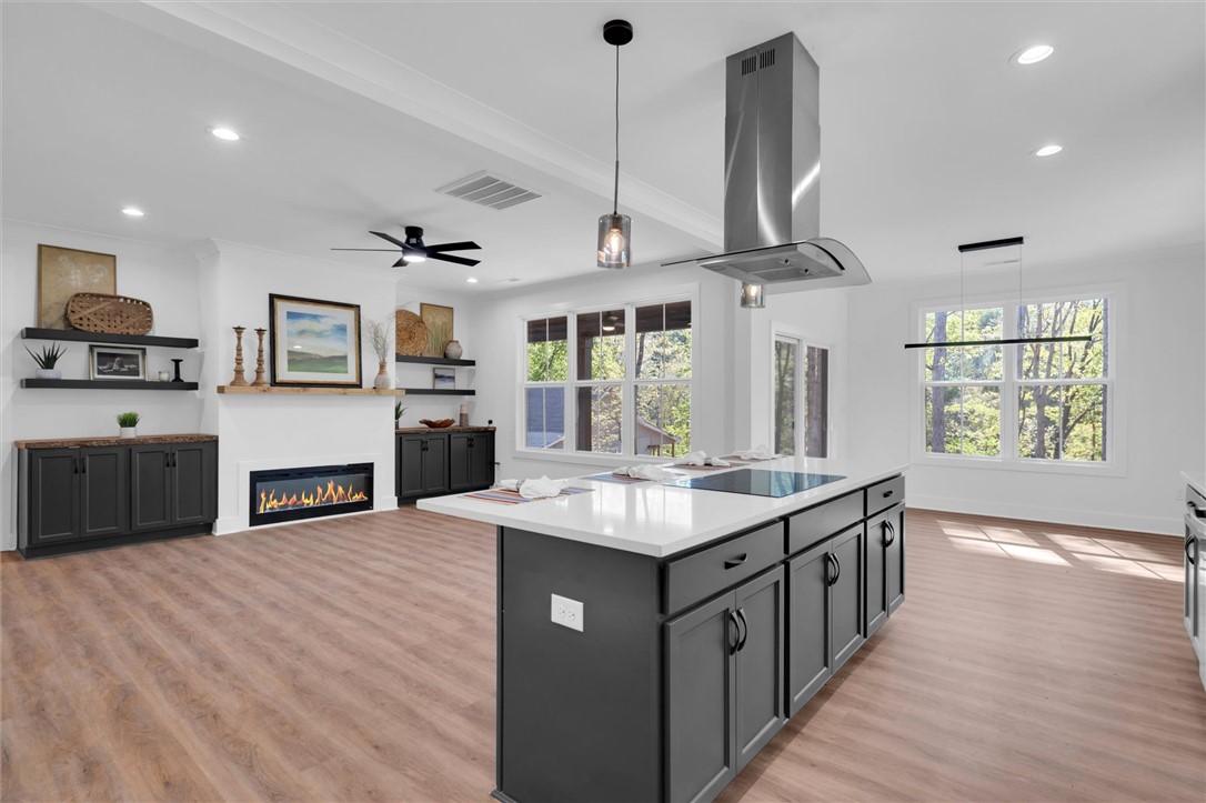 407 Blue Ridge Court Westminster, SC 29693 - Photo 12 of 48 This expansive open concept space offers bright views and abundant natural light.