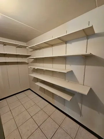 a view of a room with shelves
